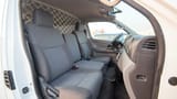 Used 2022 Nissan Urvan Standard Roof in White – Front Passenger Side Cabin View for Sale at First Choice Cars Dubai Sharjah