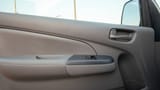 Used 2022 Nissan Urvan Standard Roof in White – Driver Door Panel Full View for Sale at First Choice Cars Dubai Sharjah