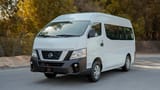 Used 2021 Nissan Urvan High Roof in White – Left Front Diagonal (45°) View for Sale at First Choice Cars Dubai Sharjah