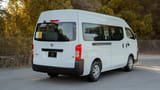 Used 2021 Nissan Urvan High Roof in White – Right Back Diagonal (45°) View for Sale at First Choice Cars Dubai Sharjah
