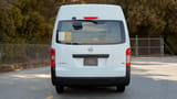 Used 2021 Nissan Urvan High Roof in White – Back/Rear View for Sale at First Choice Cars Dubai Sharjah