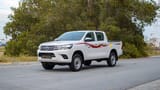 Used 2021 Toyota Hilux DLX Double Cabin in White – Left Front Diagonal (45°) View for Sale at First Choice Cars Dubai Sharjah