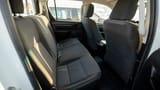 Used 2021 Toyota Hilux GLX Double Cabin in White – Rear Passenger Side Cabin View for Sale at First Choice Cars Dubai Sharjah