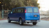 Used 2019 GMC Savana Passanger Van in Blue – Left Back Diagonal (45°) View for Sale at First Choice Cars Dubai Sharjah
