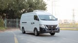 Used 2023 Nissan Urvan High Roof in White – Right Front Diagonal (45°) View for Sale at First Choice Cars Dubai Sharjah