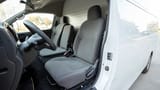 Used 2023 Nissan Urvan High Roof in White – Front Driver Side Cabin View for Sale at First Choice Cars Dubai Sharjah