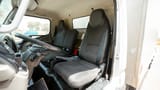 Used 2020 Mitsubishi Canter Chiller Box in White – Front Driver Side Cabin View for Sale at First Choice Cars Dubai Sharjah