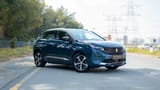 Used 2022 Peugeot 3008 Hybrid 4 GT in Blue – Right Front Diagonal (45°) View for Sale at First Choice Cars Dubai Sharjah
