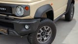 Used 2025 Suzuki Jimny GLX in Beige – Headlight Close-up for Sale at First Choice Cars Dubai Sharjah