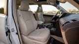 Used 2022 Toyota Prado VXR in White – Front Passenger Side Cabin View for Sale at First Choice Cars Dubai Sharjah
