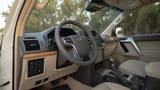 Used 2022 Toyota Prado VXR in White – Driver Side Dashboard & Steering View for Sale at First Choice Cars Dubai Sharjah