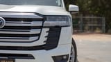 Used 2024 Toyota Land Cruiser GXR in White – Headlight Close-up for Sale at First Choice Cars Dubai Sharjah