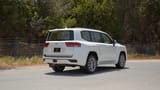Used 2024 Toyota Land Cruiser GXR in White – Right Back Diagonal (45°) View for Sale at First Choice Cars Dubai Sharjah