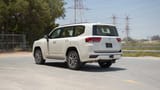 Used 2024 Toyota Land Cruiser GXR in White – Left Back Diagonal (45°) View for Sale at First Choice Cars Dubai Sharjah