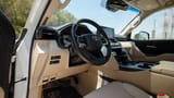Used 2024 Toyota Land Cruiser GXR in White – Driver Side Dashboard & Steering View for Sale at First Choice Cars Dubai Sharjah