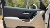 Used 2024 Toyota Land Cruiser GXR in White – Driver Door Panel Full View for Sale at First Choice Cars Dubai Sharjah