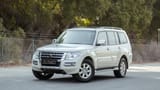 Used 2022 Mitsubishi Pajero GLS in White – Left Front Diagonal (45°) View for Sale at First Choice Cars Dubai Sharjah
