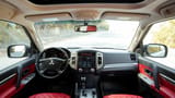 Used 2022 Mitsubishi Pajero GLS in White – Front Cabin / Dashboard Full View for Sale at First Choice Cars Dubai Sharjah