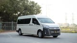 Used 2025 Toyota Hiace GLX High Roof in White – Right Front Diagonal (45°) View for Sale at First Choice Cars Dubai Sharjah