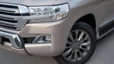 Used 2017 Toyota Land Cruiser GXR in Beige – Headlight Close-up for Sale at First Choice Cars Dubai Sharjah