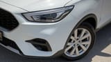 Used 2023 MG ZS Comfort in White – Headlight Close-up for Sale at First Choice Cars Dubai Sharjah