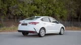 Used 2023 Hyundai Accent Smart in White – Right Back Diagonal (45°) View for Sale at First Choice Cars Dubai Sharjah