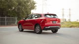 Used 2023 Haval Jolion Plus in Red – Left Back Diagonal (45°) View for Sale at First Choice Cars Dubai Sharjah
