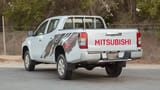 Used 2020 Mitsubishi L200 GLX Double Cabin in White – Left Back Diagonal (45°) View for Sale at First Choice Cars Dubai Sharjah