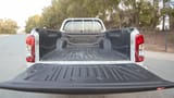 Used 2020 Mitsubishi L200 GLX Double Cabin in White – Boot / Trunk Space Open View for Sale at First Choice Cars Dubai Sharjah