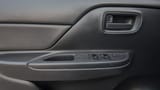 Used 2020 Mitsubishi L200 GLX Double Cabin in White – Driver Door Panel Full View for Sale at First Choice Cars Dubai Sharjah
