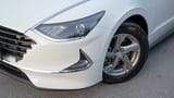Used 2023 Hyundai Sonata Comfort in White – Headlight Close-up for Sale at First Choice Cars Dubai Sharjah