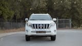 Used 2016 Toyota Prado VXR in White – Front View for Sale at First Choice Cars Dubai Sharjah