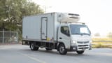 Used 2022 Mitsubishi Canter Chiller Box in White – Right Front Diagonal (45°) View for Sale at First Choice Cars Dubai Sharjah