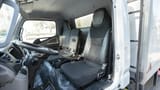Used 2022 Mitsubishi Canter Chiller Box in White – Front Driver Side Cabin View for Sale at First Choice Cars Dubai Sharjah