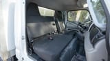 Used 2022 Mitsubishi Canter Chiller Box in White – Front Passenger Side Cabin View for Sale at First Choice Cars Dubai Sharjah
