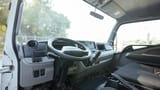 Used 2022 Mitsubishi Canter Chiller Box in White – Driver Side Dashboard & Steering View for Sale at First Choice Cars Dubai Sharjah