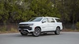Used 2023 Chevrolet Suburban LT in White – Left Front Diagonal (45°) View for Sale at First Choice Cars Dubai Sharjah