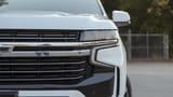 Used 2023 Chevrolet Suburban LT in White – Headlight Close-up for Sale at First Choice Cars Dubai Sharjah
