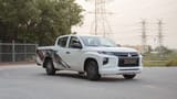 Used 2023 Mitsubishi L200 GLX Double Cabin in White – Right Front Diagonal (45°) View for Sale at First Choice Cars Dubai Sharjah