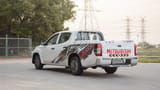 Used 2023 Mitsubishi L200 GLX Double Cabin in White – Left Back Diagonal (45°) View for Sale at First Choice Cars Dubai Sharjah