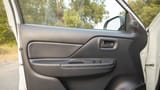 Used 2023 Mitsubishi L200 GLX Double Cabin in White – Driver Door Panel Full View for Sale at First Choice Cars Dubai Sharjah