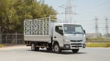Used 2024 Mitsubishi Canter Cargo Body in White – Right Front Diagonal (45°) View for Sale at First Choice Cars Dubai Sharjah