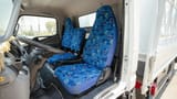Used 2024 Mitsubishi Canter Cargo Body in White – Front Driver Side Cabin View for Sale at First Choice Cars Dubai Sharjah