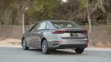 Used 2024 Geely Emgrand GS in Grey – Left Back Diagonal (45°) View for Sale at First Choice Cars Dubai Sharjah