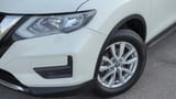 Used 2022 Nissan X-Trail S in White – Headlight Close-up for Sale at First Choice Cars Dubai Sharjah