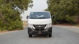 Used 2023 Nissan Urvan Standard Roof in White – Front View for Sale at First Choice Cars Dubai Sharjah