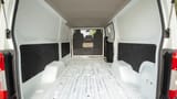 Used 2023 Nissan Urvan Standard Roof in White – Delivery Box Rear Opening View for Sale at First Choice Cars Dubai Sharjah