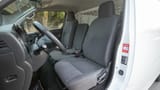 Used 2023 Nissan Urvan Standard Roof in White – Front Driver Side Cabin View for Sale at First Choice Cars Dubai Sharjah