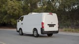Used 2023 Nissan Urvan Standard Roof in White – Left Back Diagonal (45°) View for Sale at First Choice Cars Dubai Sharjah