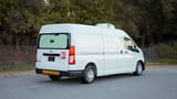 Used 2020 Toyota Hiace GLX High Roof in White – Right Back Diagonal (45°) View for Sale at First Choice Cars Dubai Sharjah